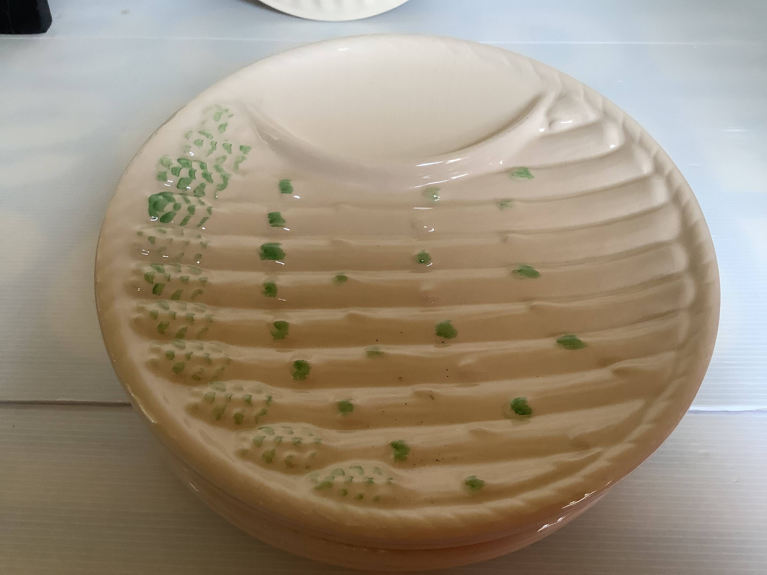 Six antique asparagus plates