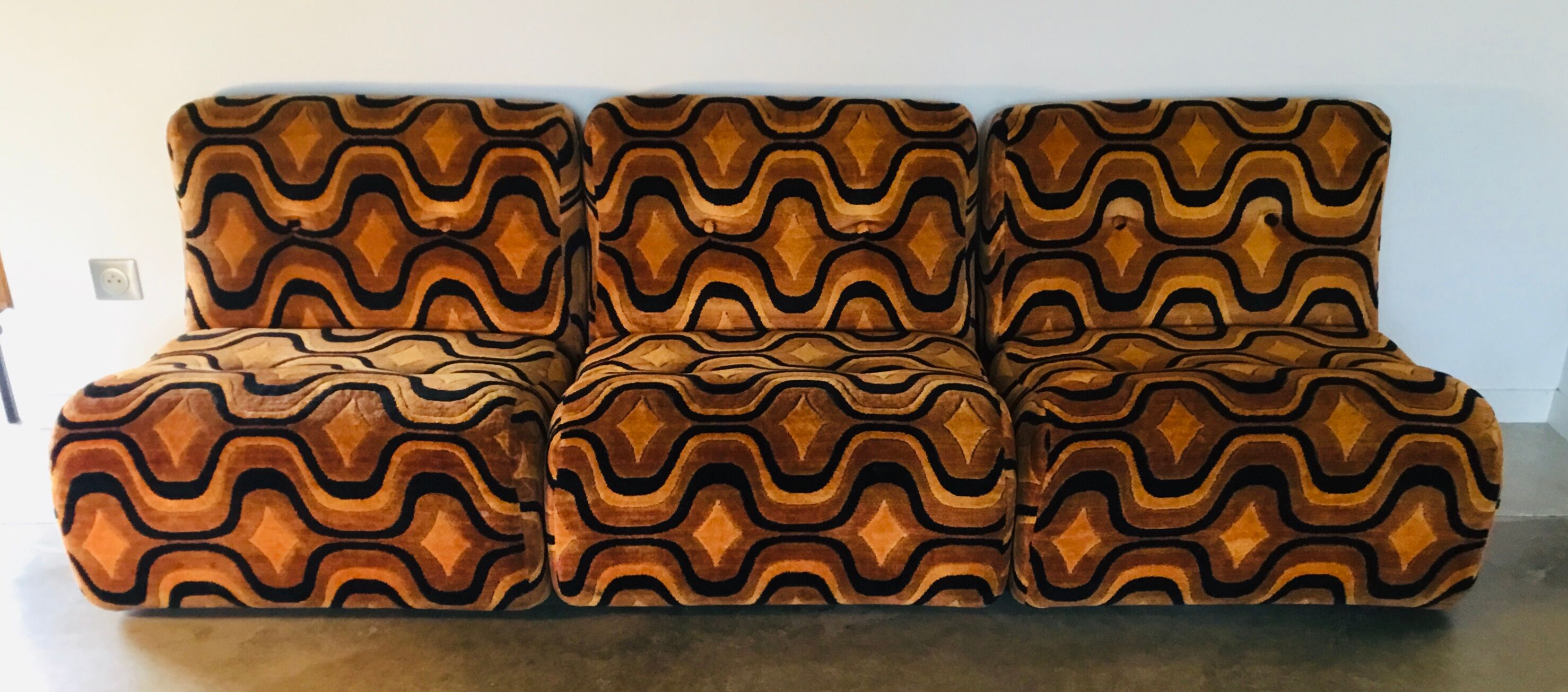Vintage 1970s orange geometric patterned space-age armchair
