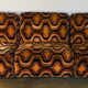Vintage 1970s orange geometric patterned space-age armchair
