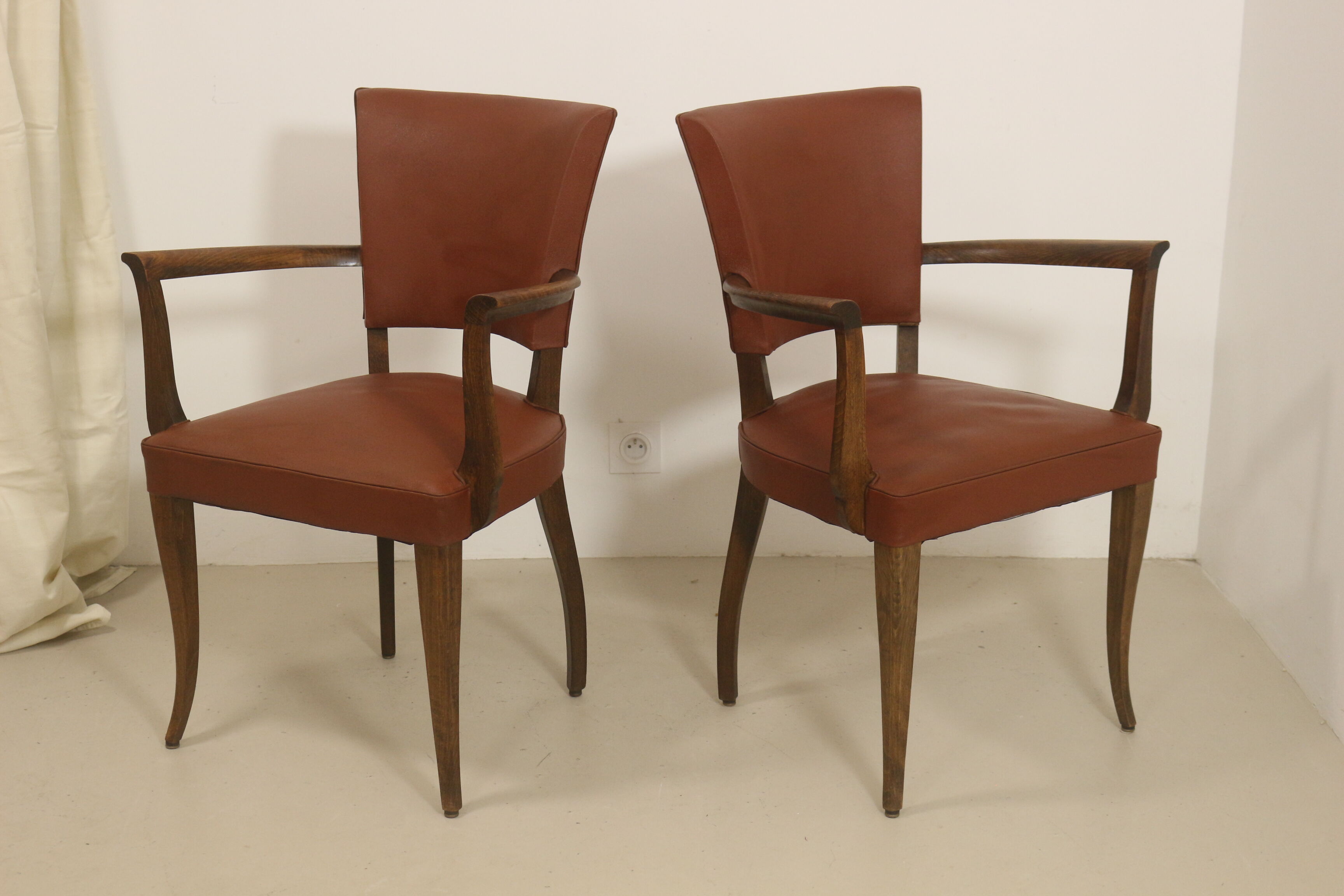 Pair of vintage bridge armchairs year 60 in imitation rust leather.