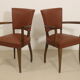 Pair of vintage bridge armchairs year 60 in imitation rust leather.