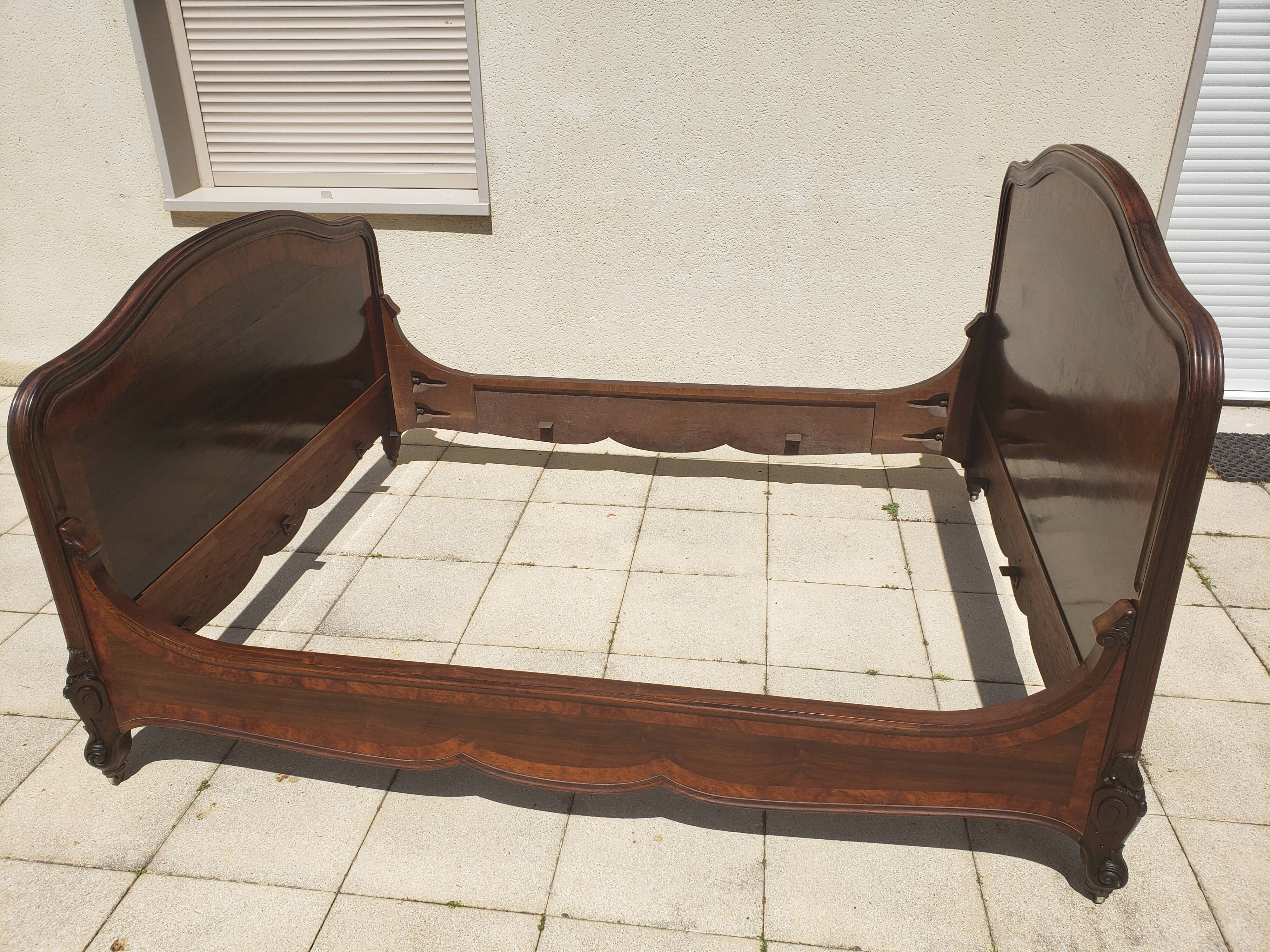 Solid walnut bed with very old walnut burl.