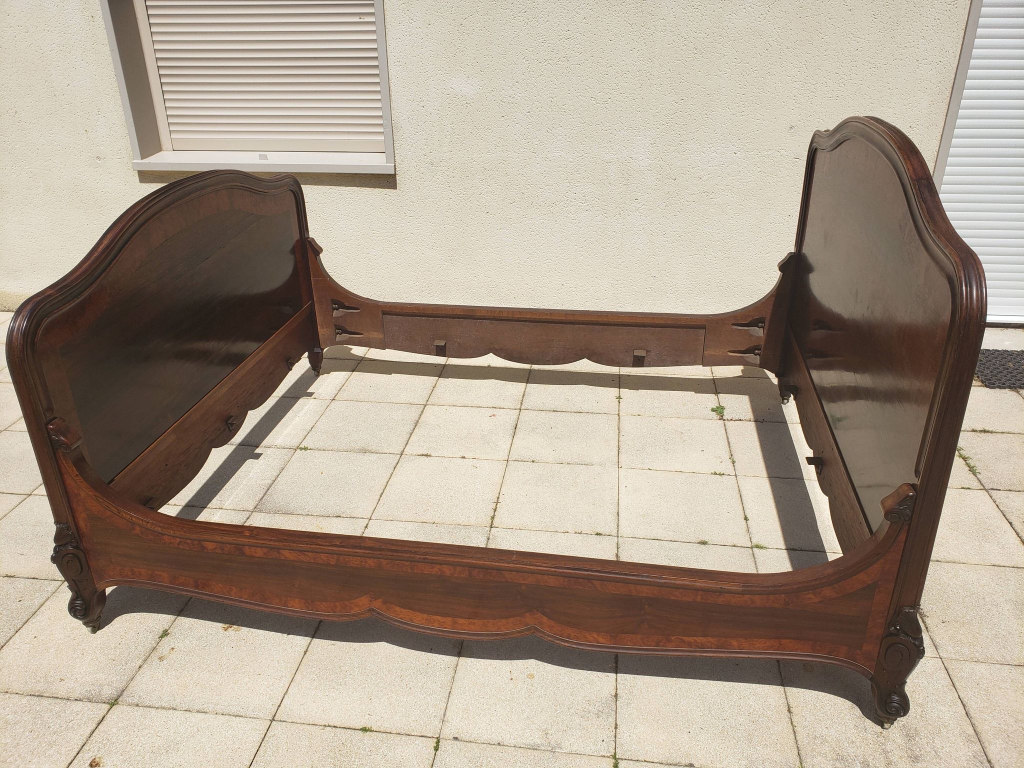 Solid walnut bed with very old walnut burl.