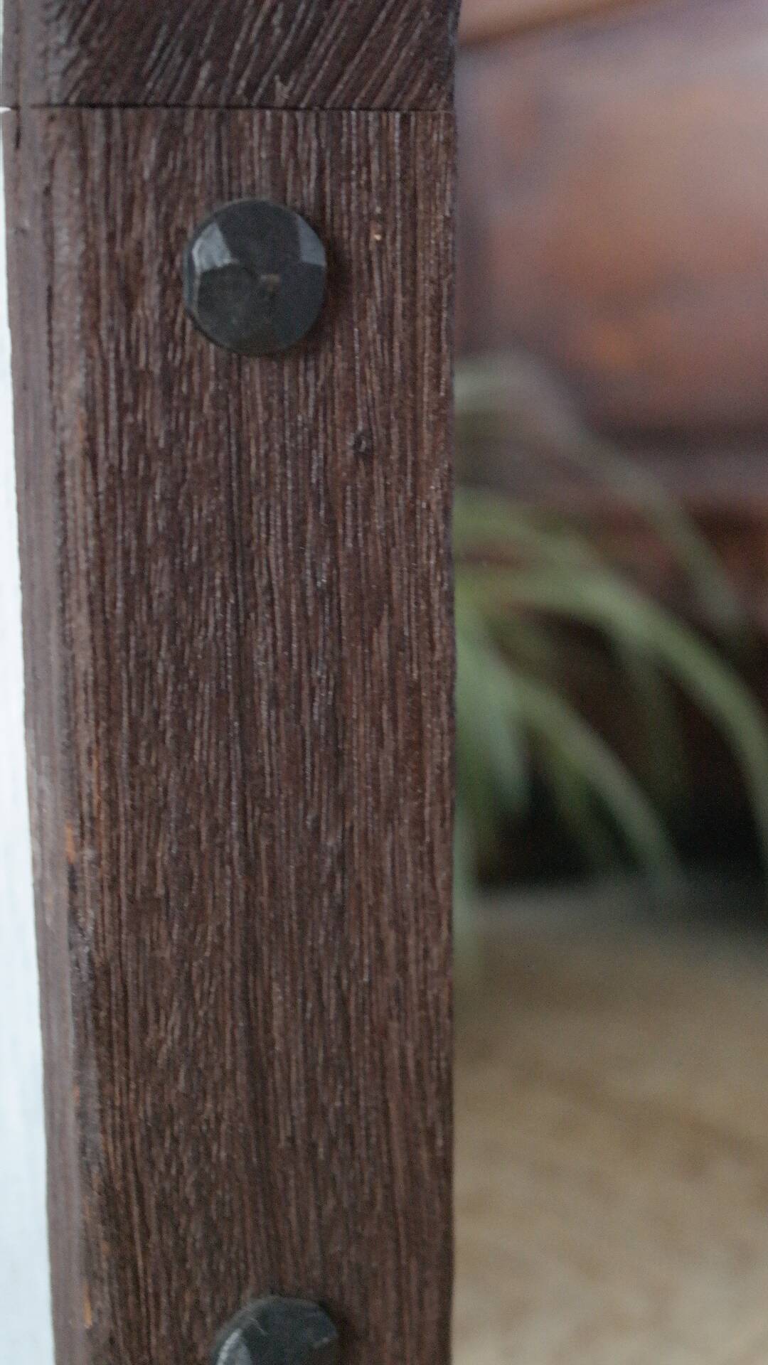 Old handcrafted Gothic style wooden mirror