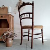 Antique chair turned wood sitting velvet flowers