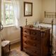 Commode galbée ancienne en acajou de style anglais