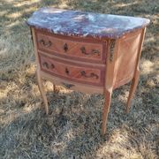 Antique commode with marquetry in the Louis XVI style and marble top.