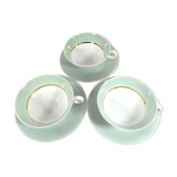 White porcelain and mint cups and saucers, half a cup