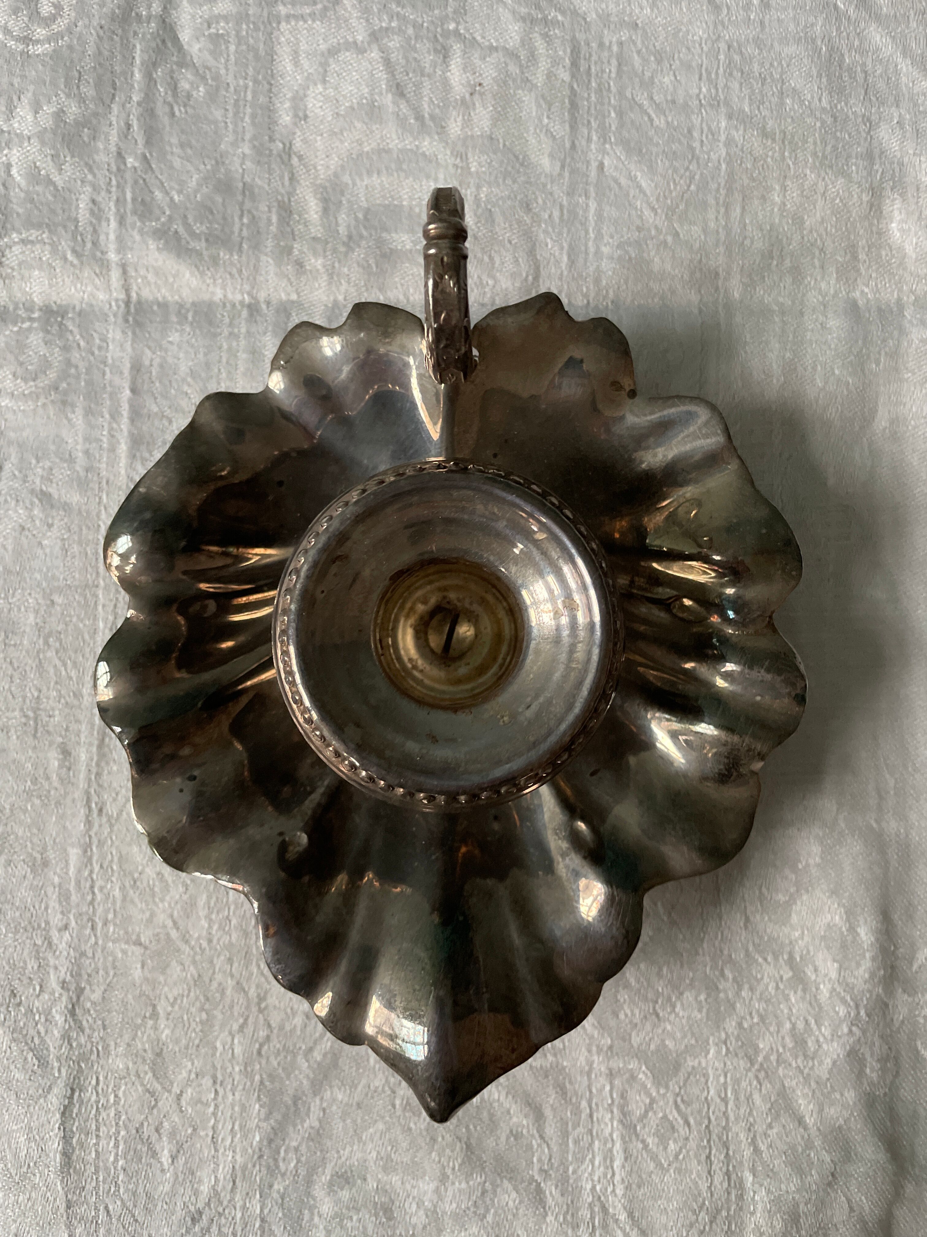 Old leaf-shaped hand candle holder, mid-twentieth