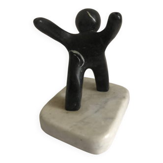 Bicolour marble sculpture of a stylised figure.