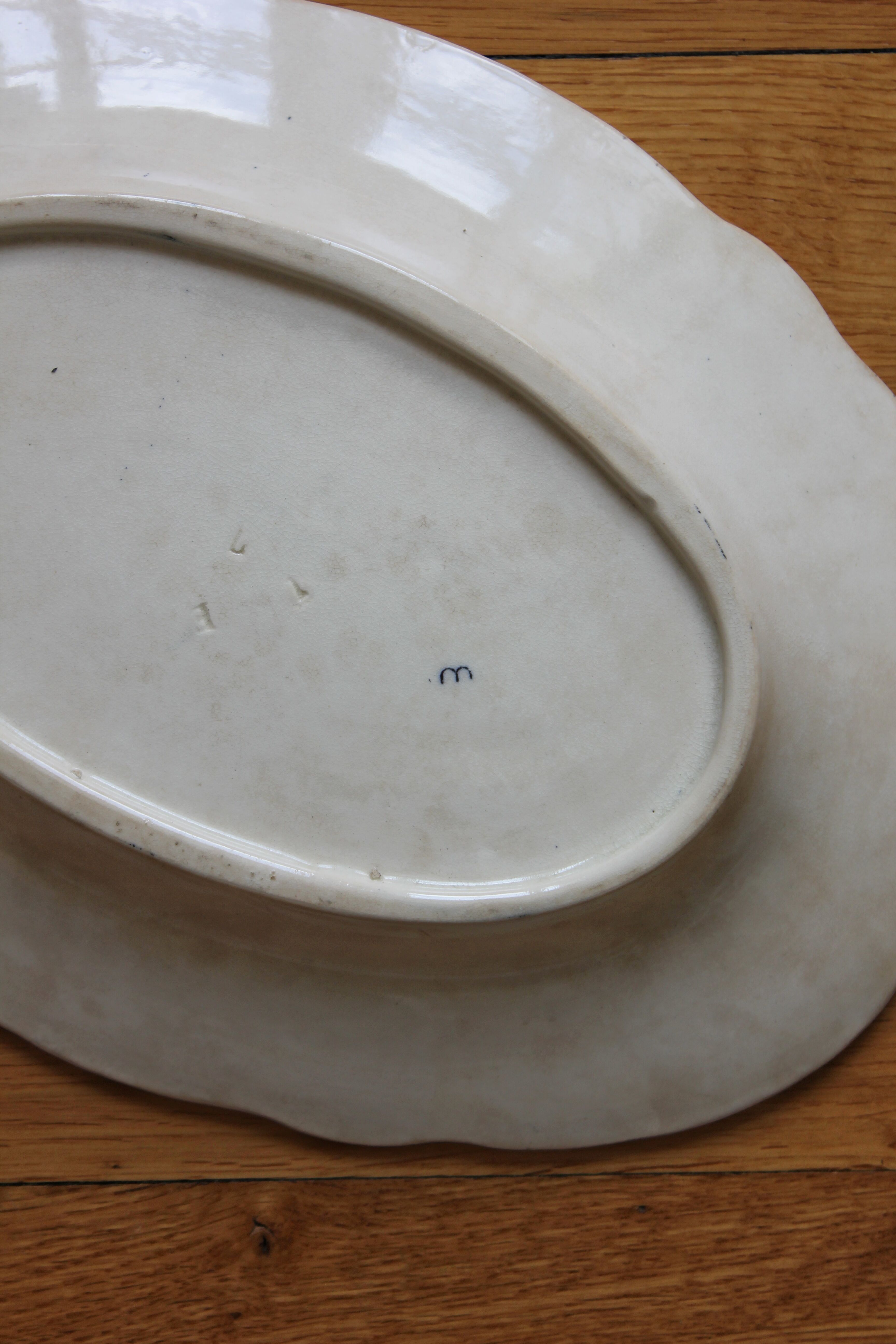 Oval ironstone dish with wheat and butterfly decoration, early 20th century
