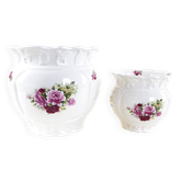 Pair of decorative ceramic vases with hand-painted roses, Art Deco style, European