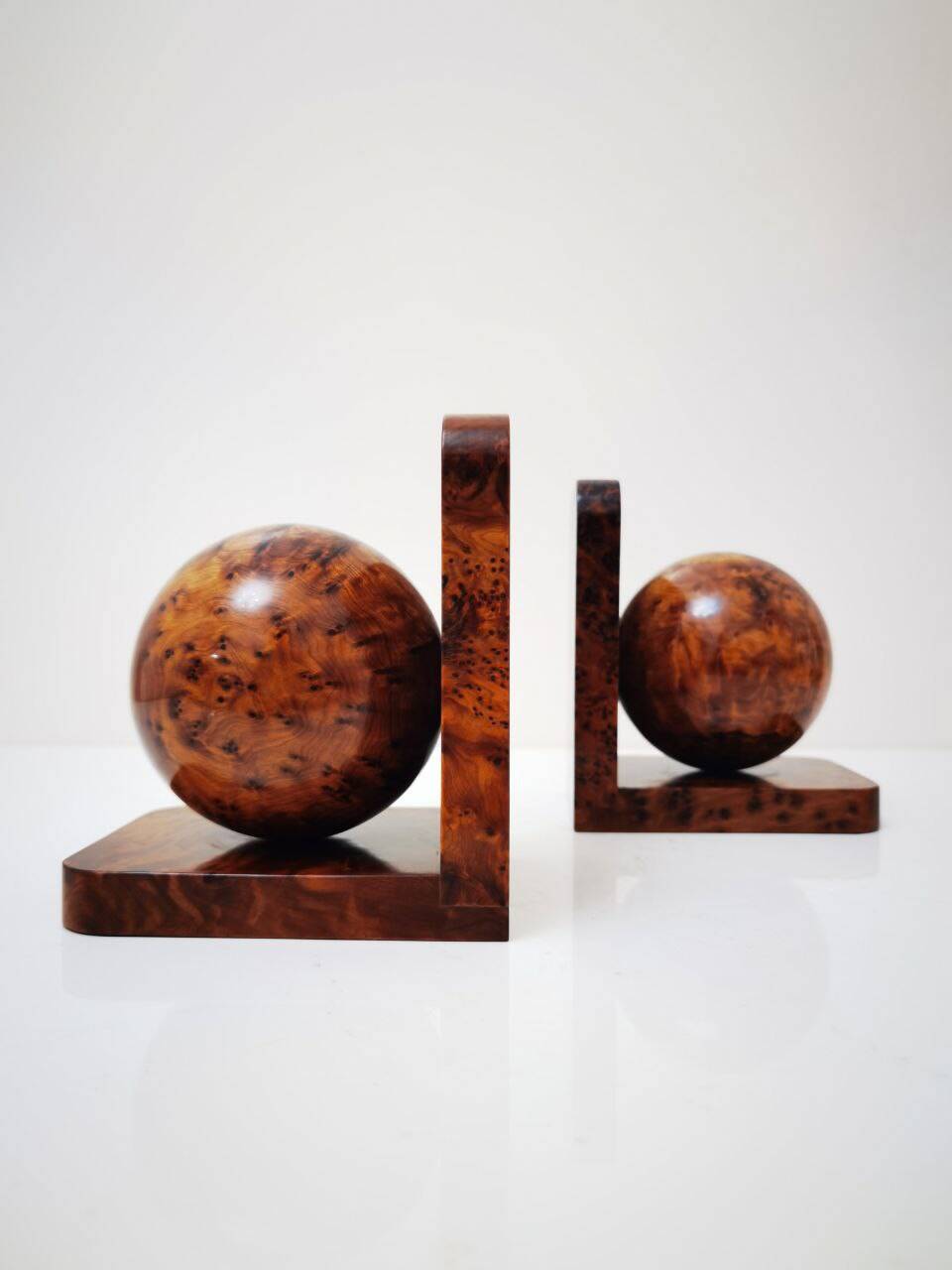 Art Deco bookends in polished solid burl wood