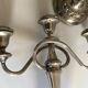 Pair of silver metal chandeliers