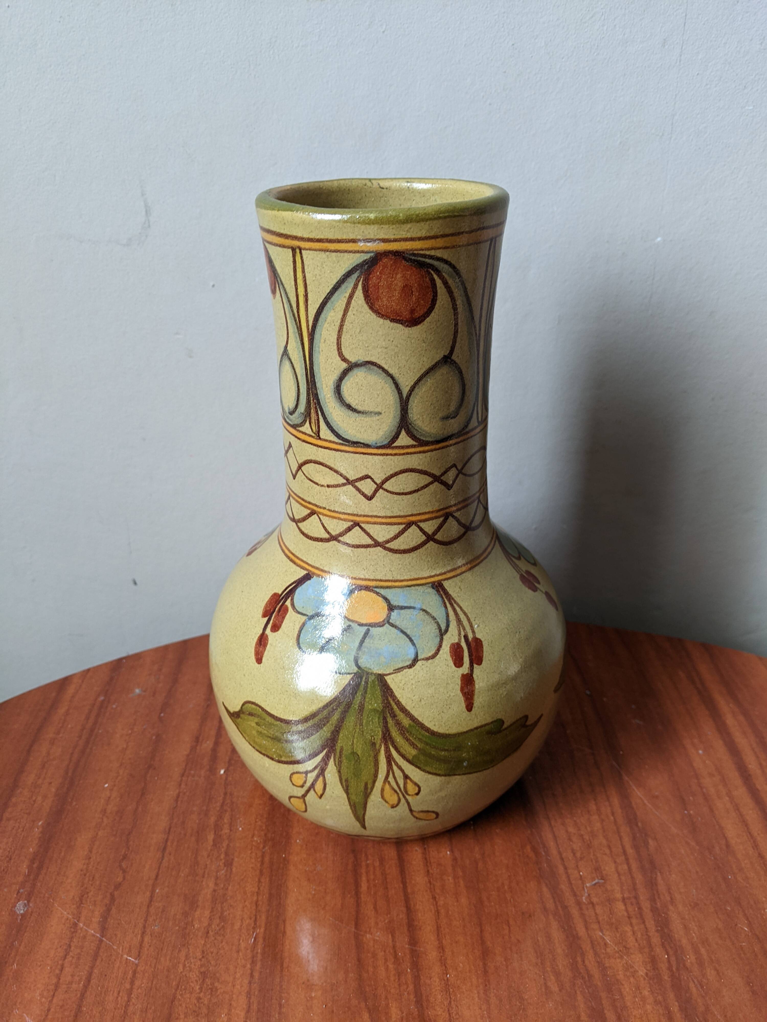 Handcrafted ceramic vase with floral decoration, Portuguese craftsmanship.