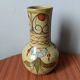 Handcrafted ceramic vase with floral decoration, Portuguese craftsmanship.