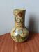 Handcrafted ceramic vase with floral decoration, Portuguese craftsmanship.