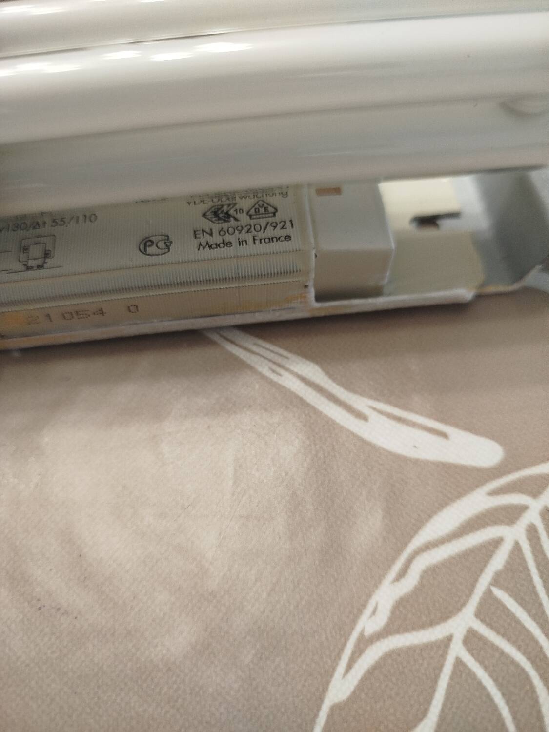 Pair of Art Deco wall sconces in plaster and pressed glass.