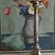 Old church candlestick in silver-plated metal