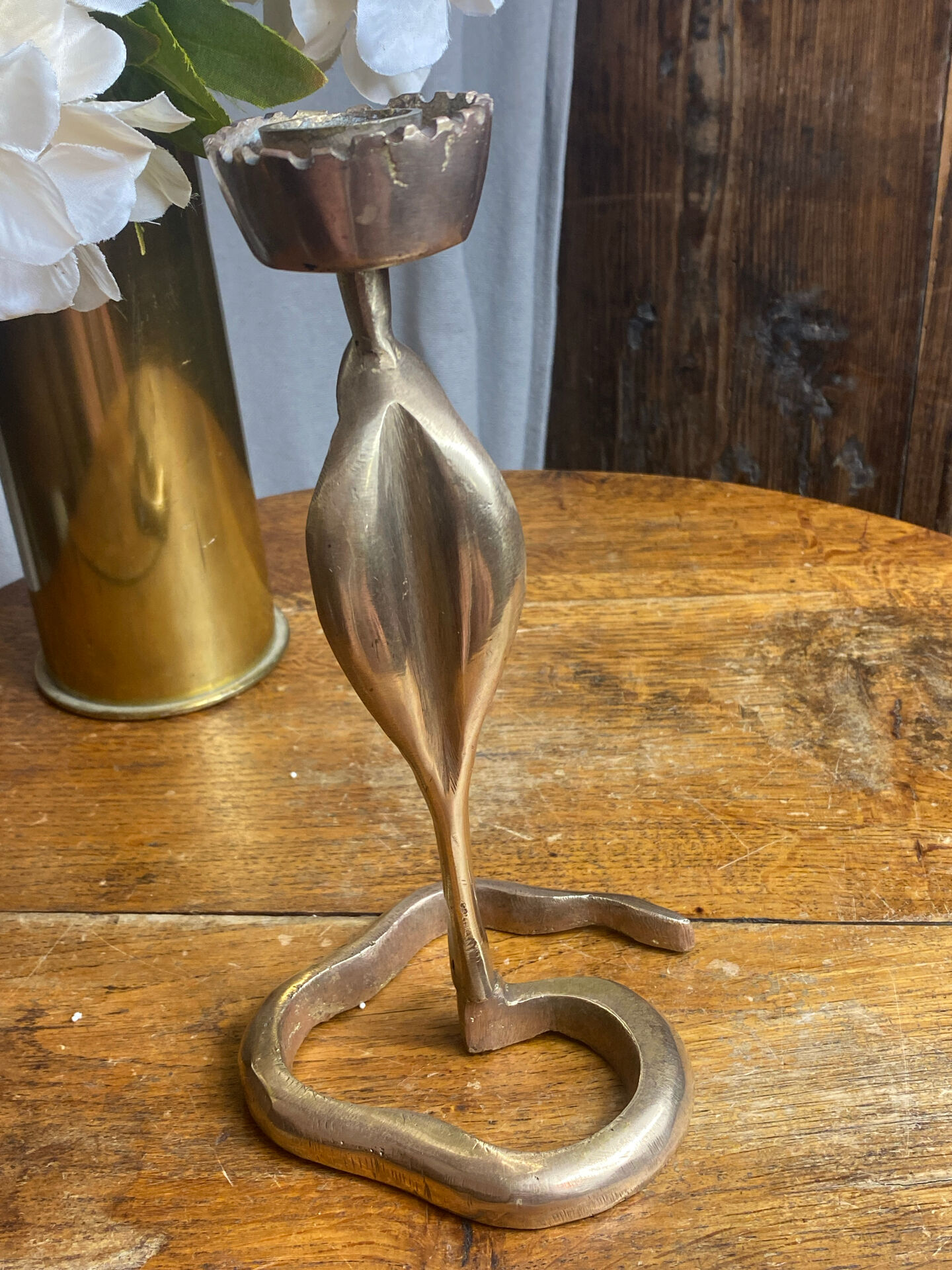 Cobra candlestick in brass