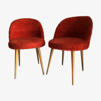 Pair of chairs red rug