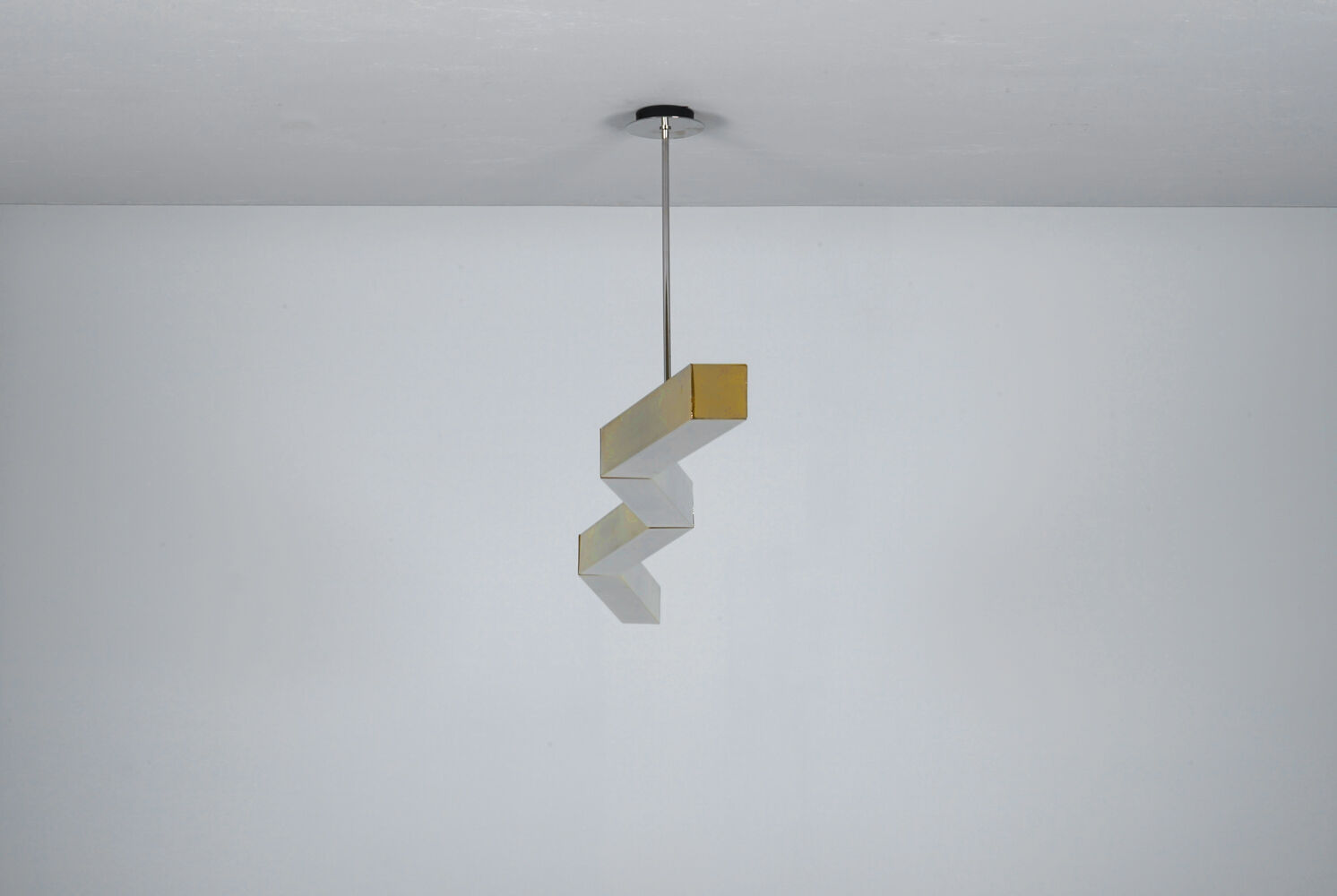 Postmodern hanging lamp in golden metal circa 1980