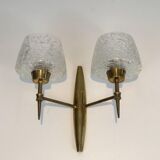 Pair of bronze sconces with worked glass reflectors