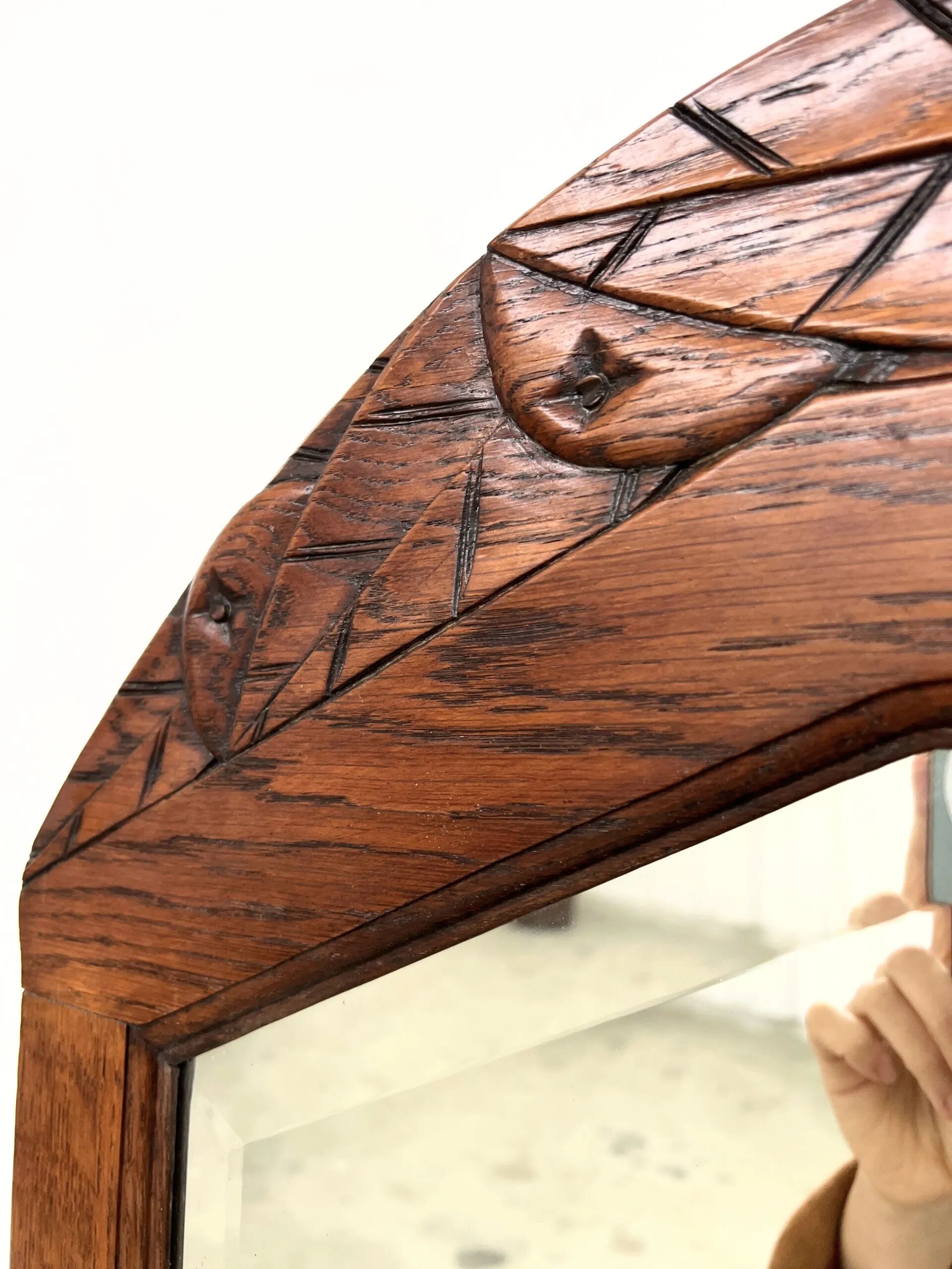Art Deco oak mirror with carved motif