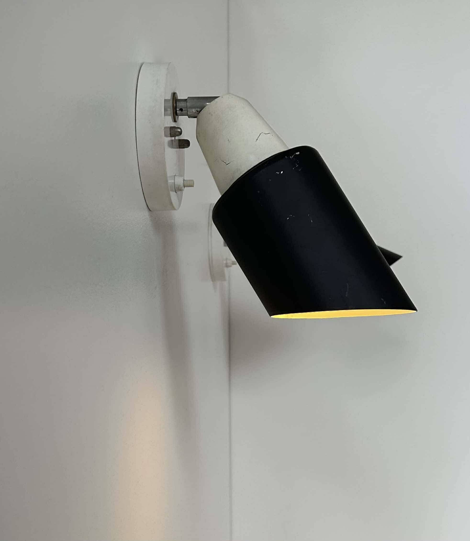 Pair of vintage adjustable wall lights, black and white, Raak Netherlands 1970