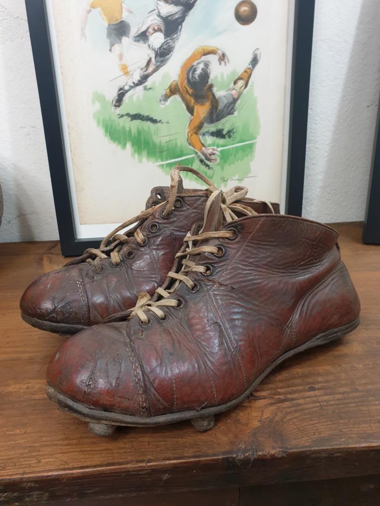 Pair of old football boots, vintage sport