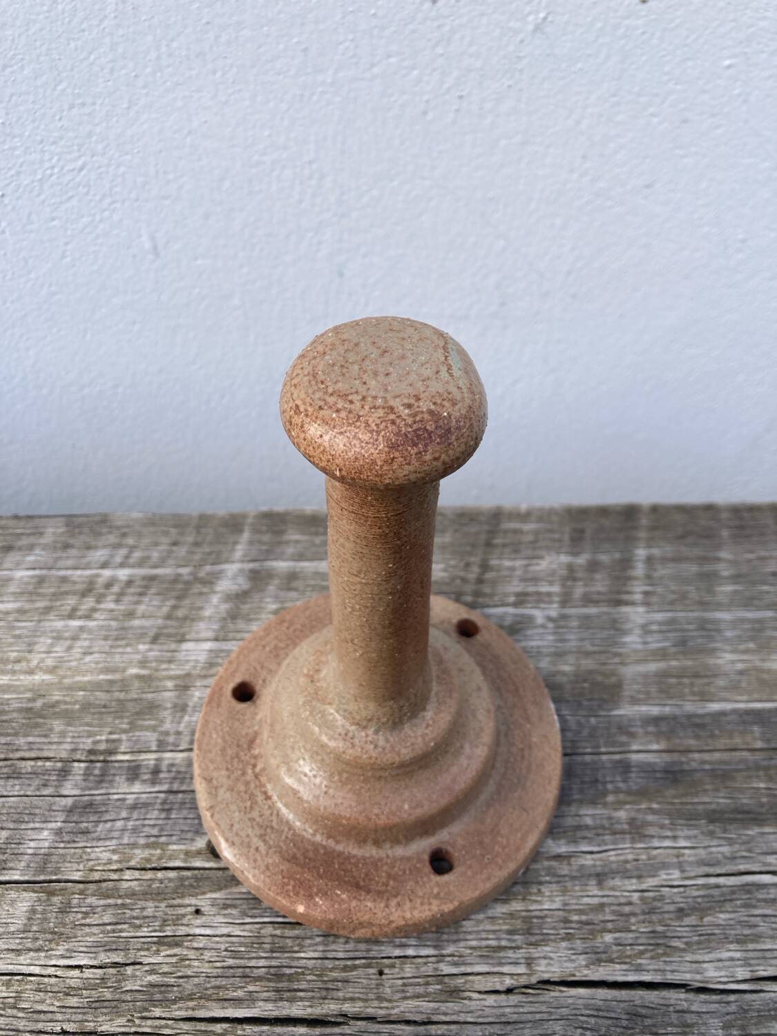 Coat hook sandstone wall light
