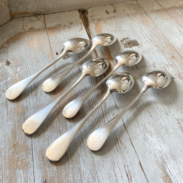 Series of 6 large silver metal spoons