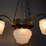 Art Deco lustre in brass and frosted pressed glass from the 1930s.