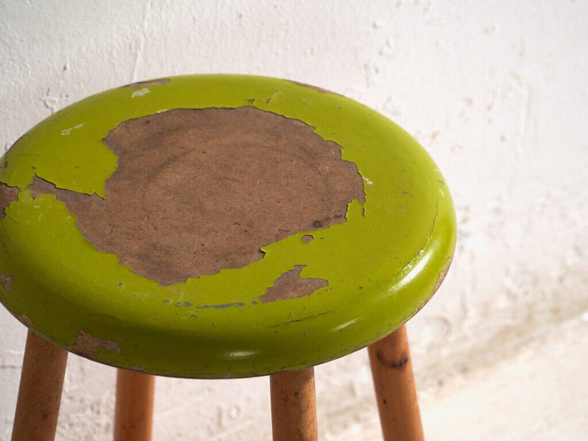 Antique wooden stool with a round seat – Central Europe, circa 1950