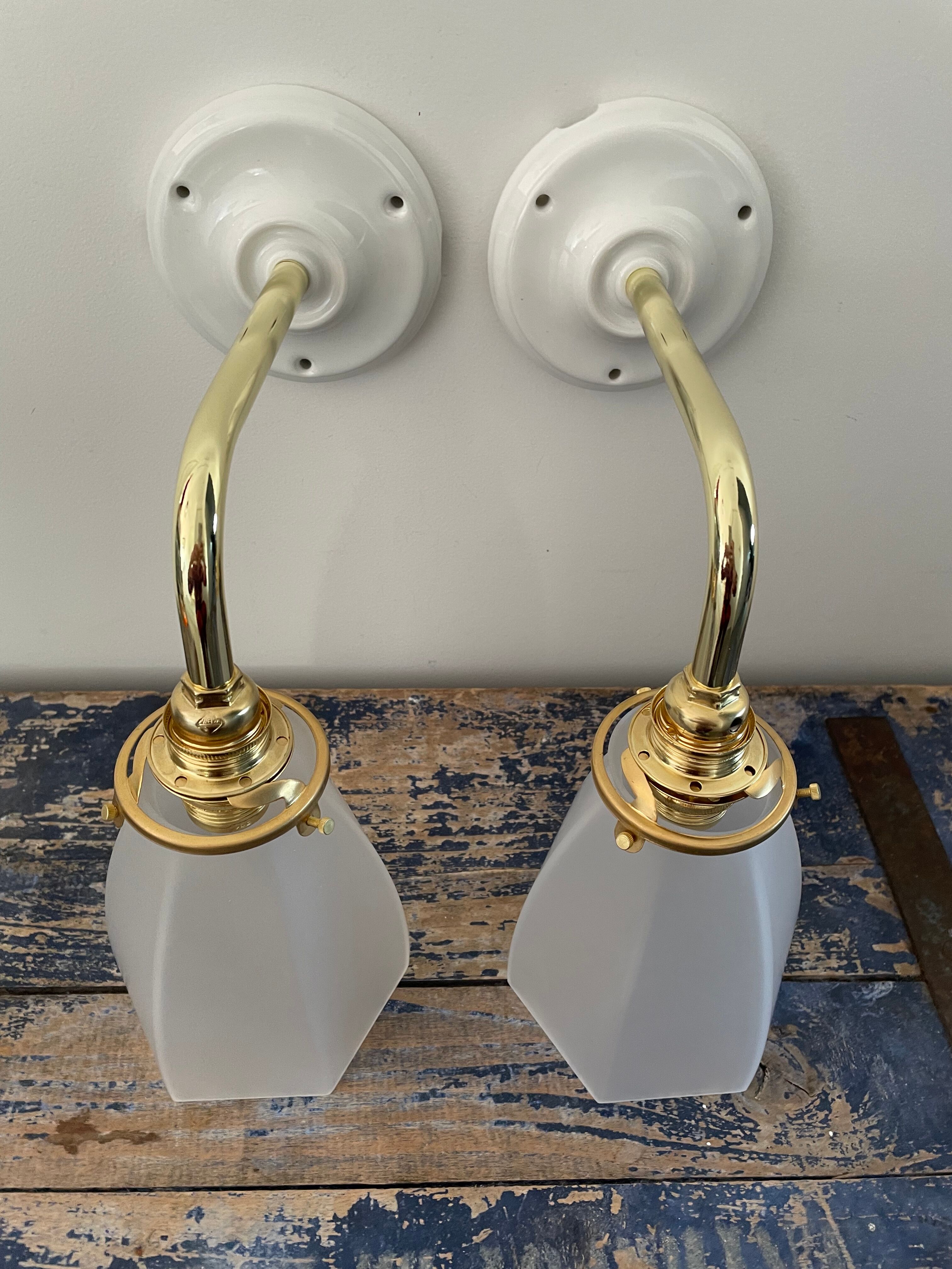 Set of two art deco wall lamps electrified to nine
