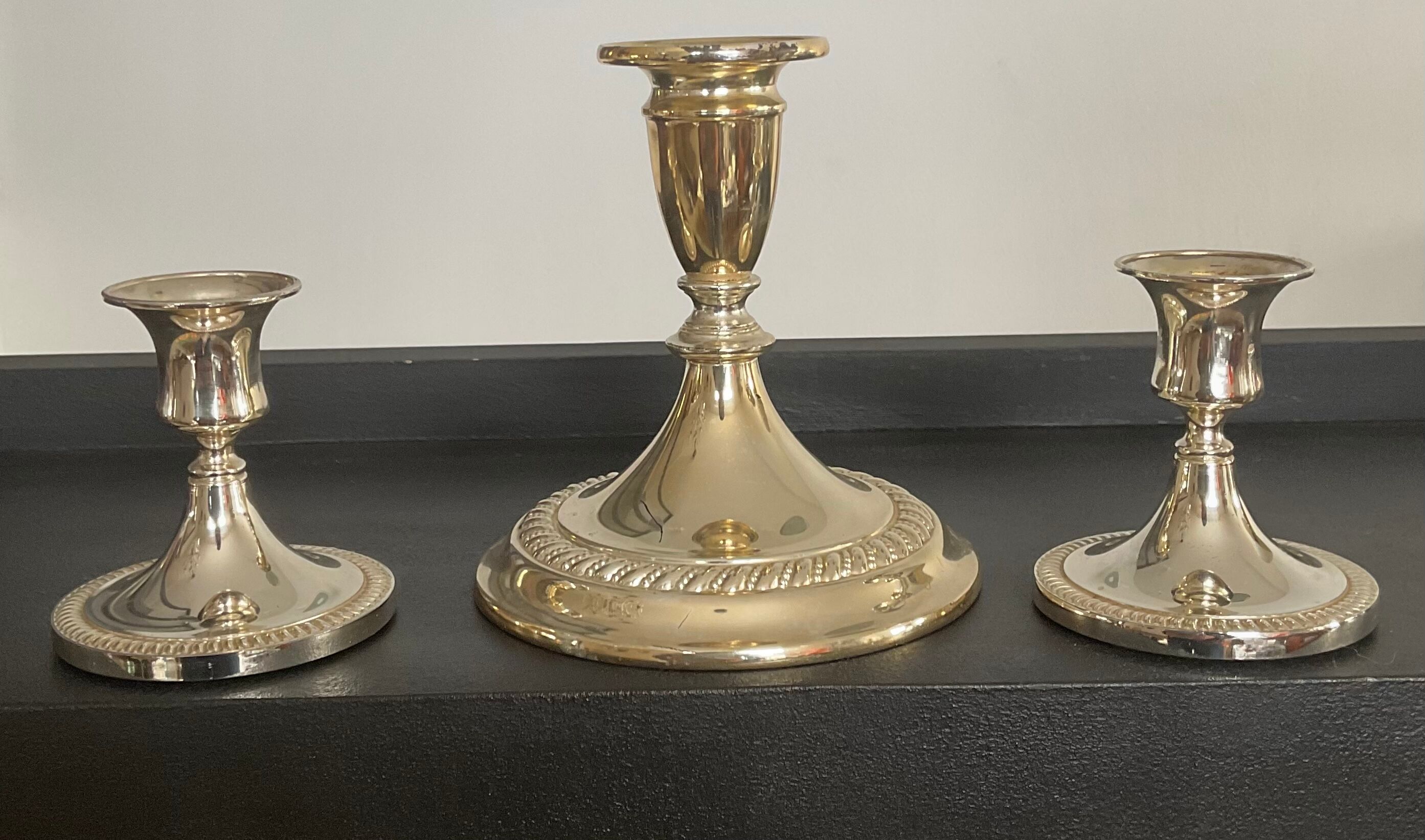 Series of 3 vintage candle holders in silver metal 70s