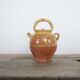 Old gargoulette pot in glazed terracotta