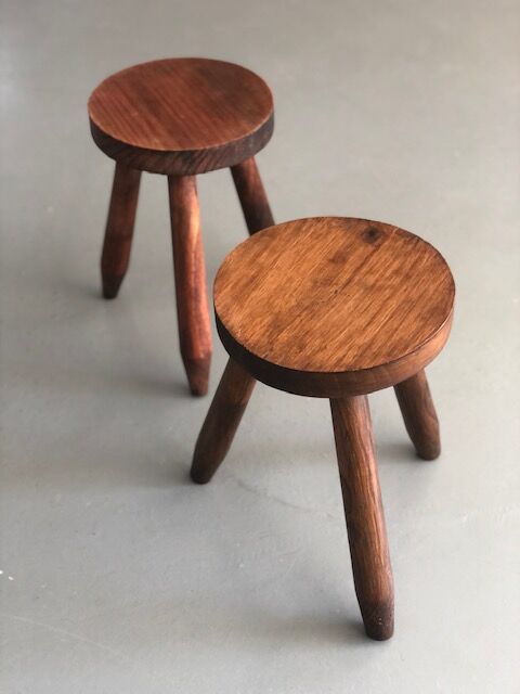 Pair of dyed wooden milking stools