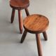Pair of dyed wooden milking stools