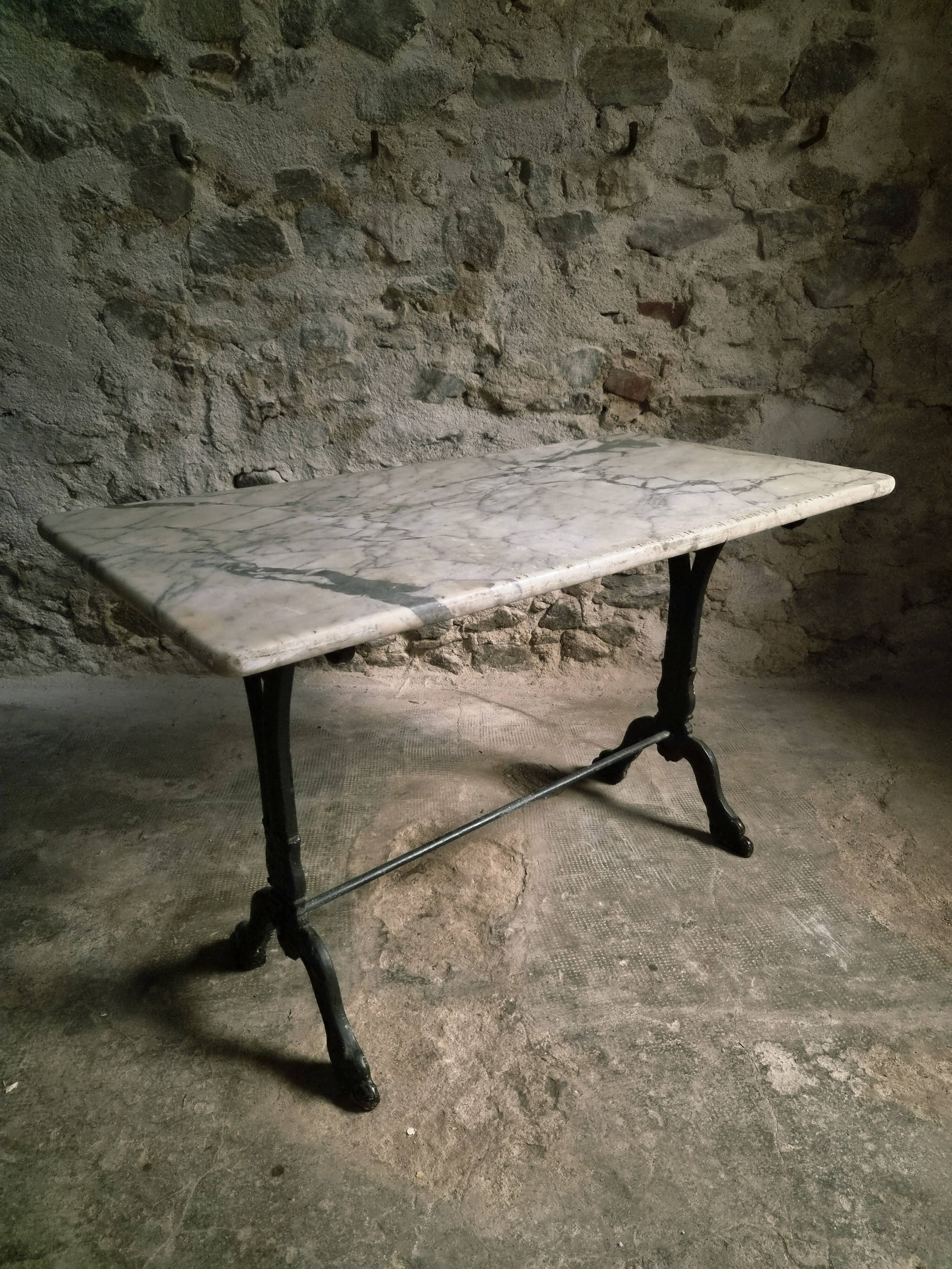 French bistro table made of marble with a cast iron base, 1920s–1930s.