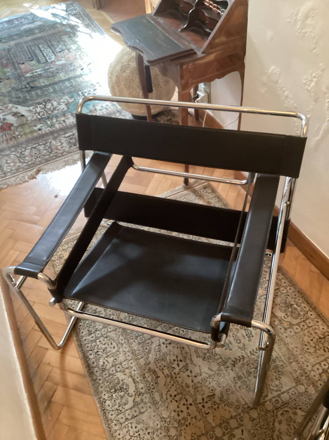 Pair of Wassily black leather armchairs