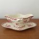 Sauce boat in opaque porcelain by gien, model "thistles". old pink color.