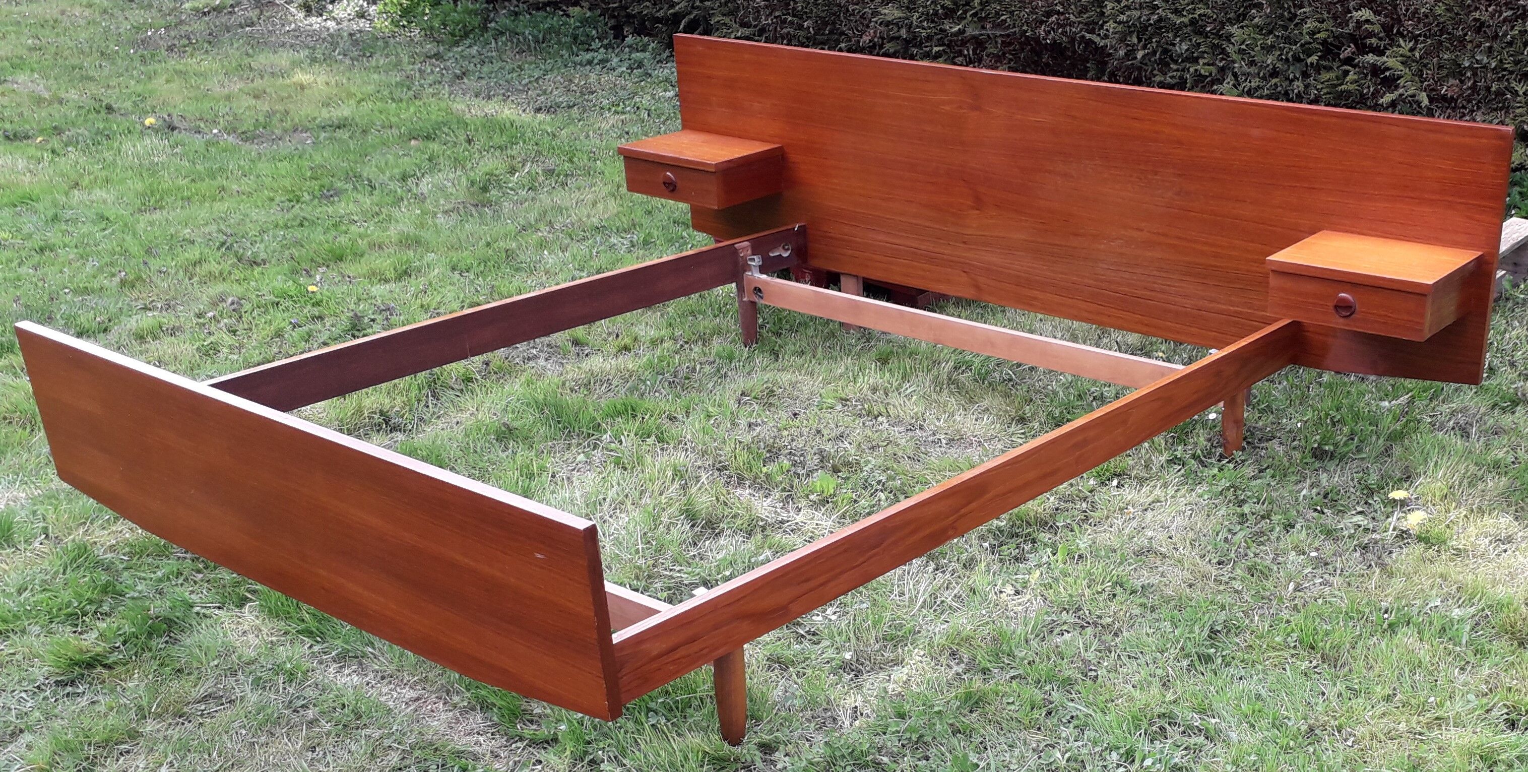 Scandinavian style bed with two built-in night tables