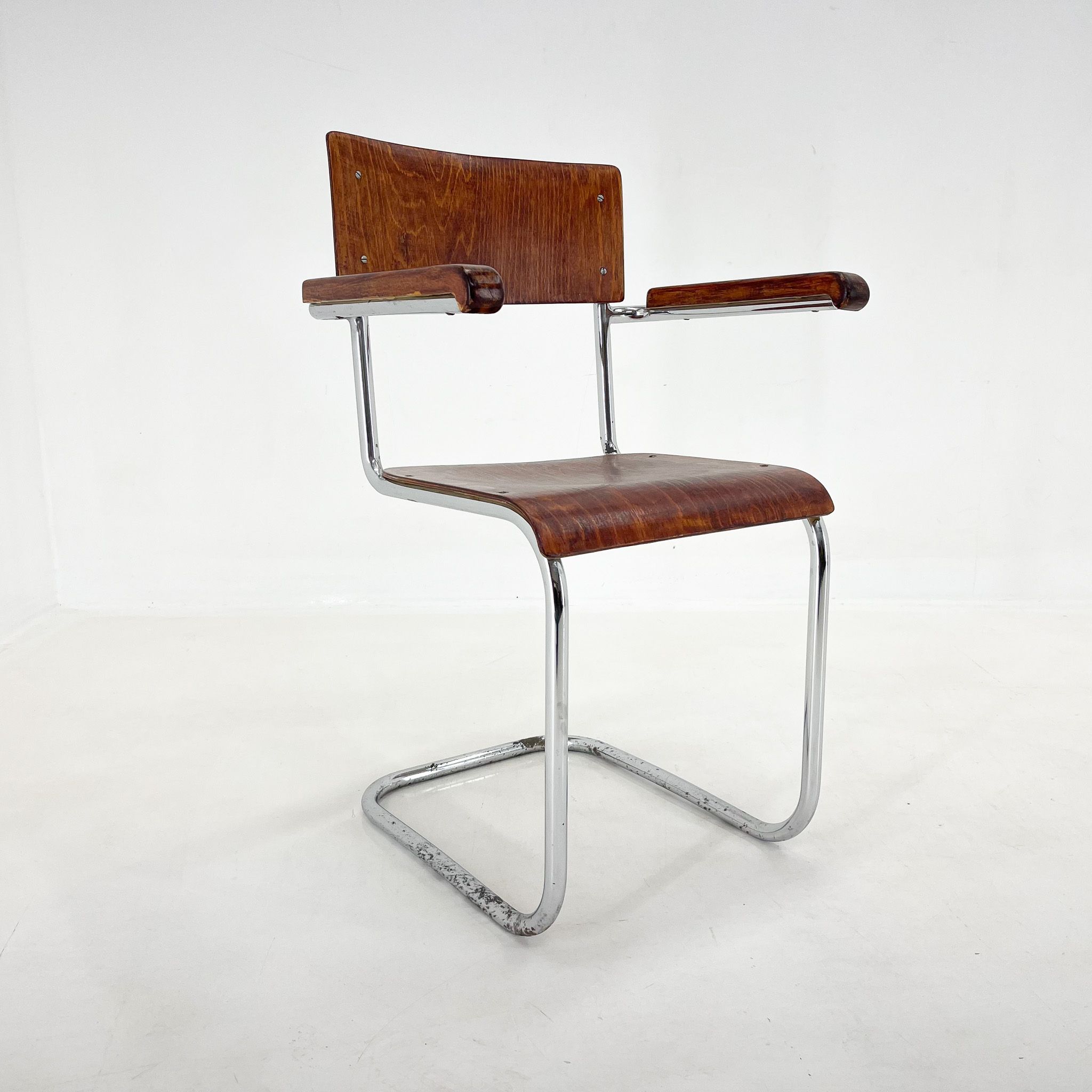 1960's Chrome Tubular Chair with Armrests