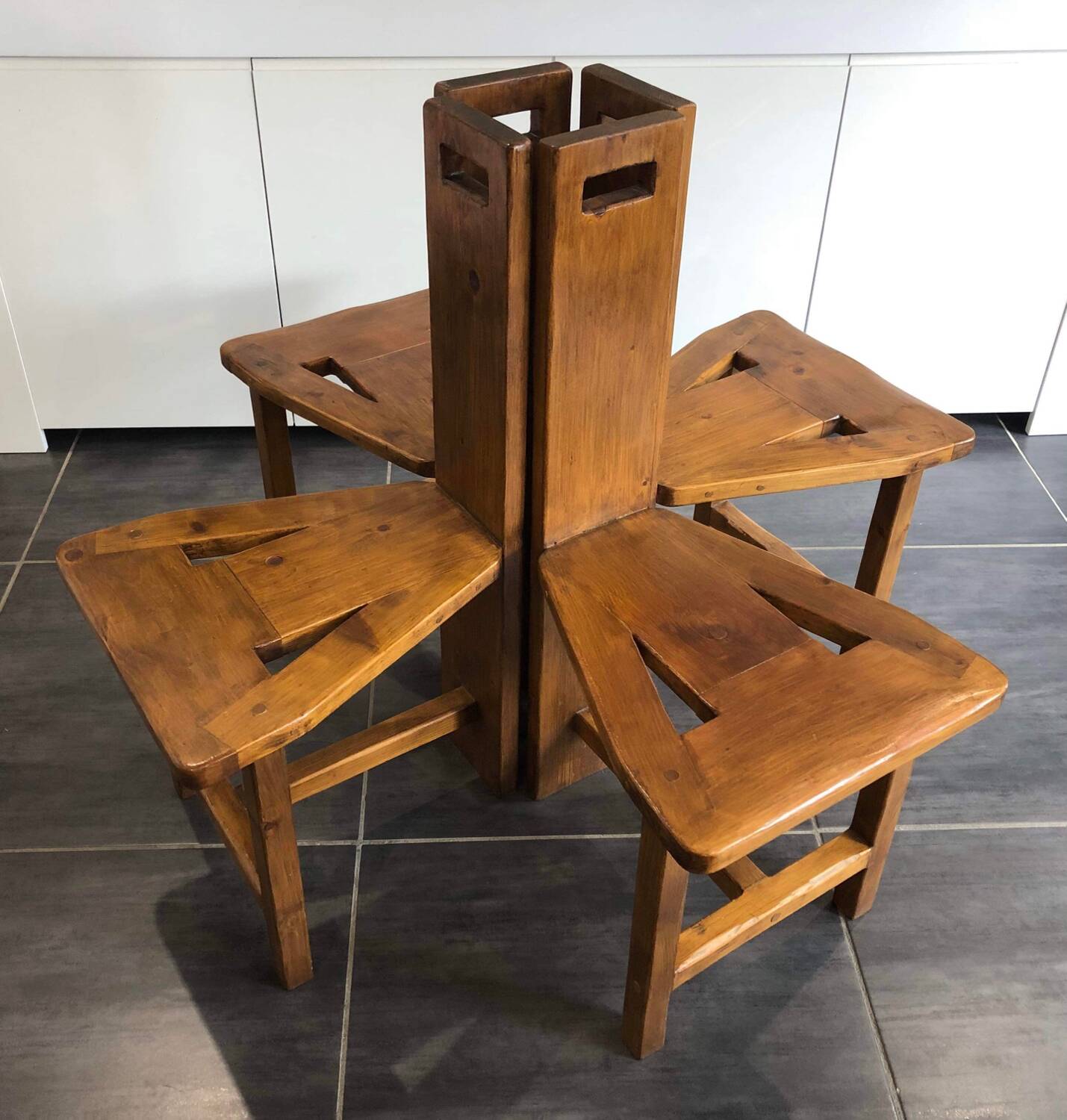 Suite of 4 brutalist-style tripod chairs