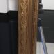 Carved wooden pediment mirror