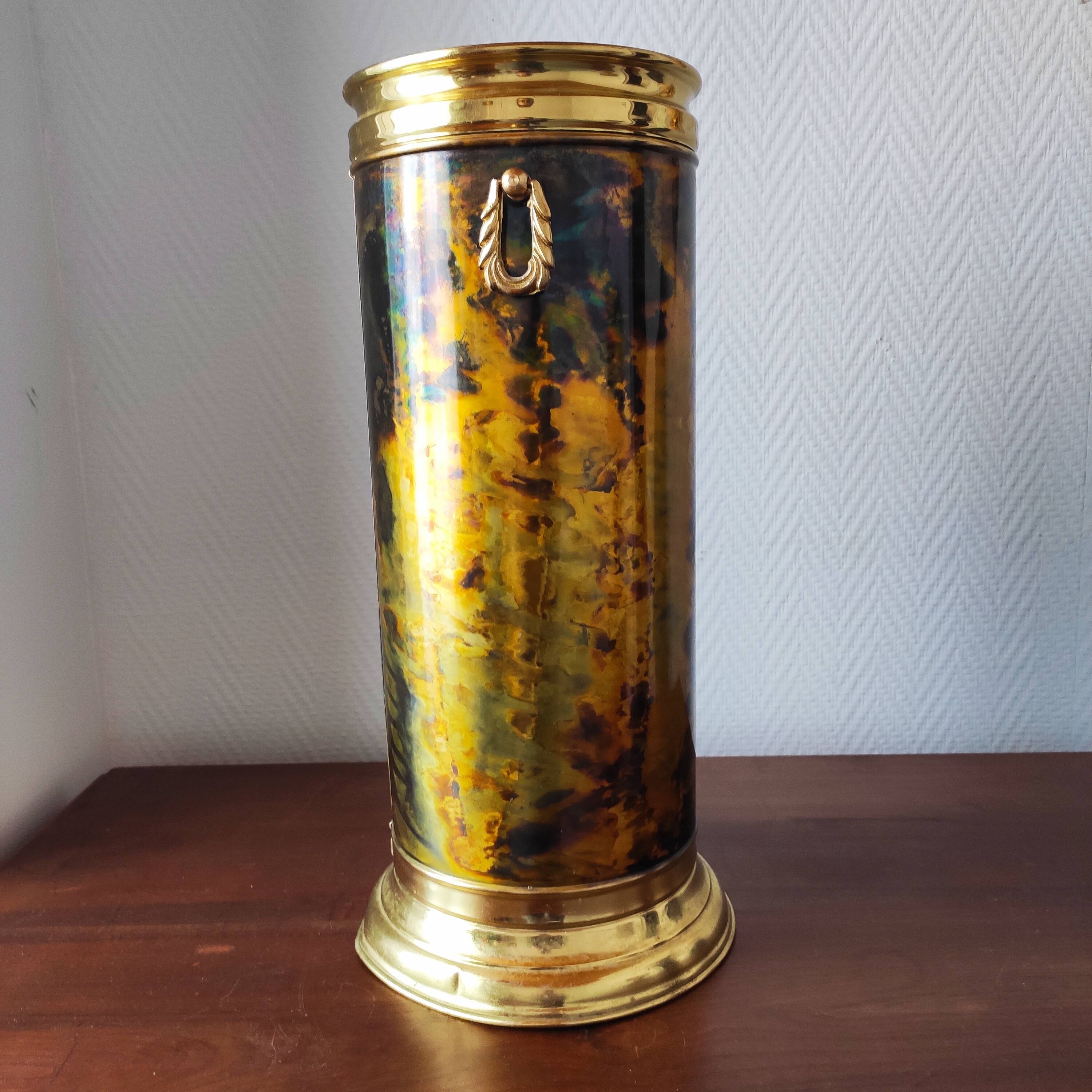 Flame-patterned golden umbrella stand