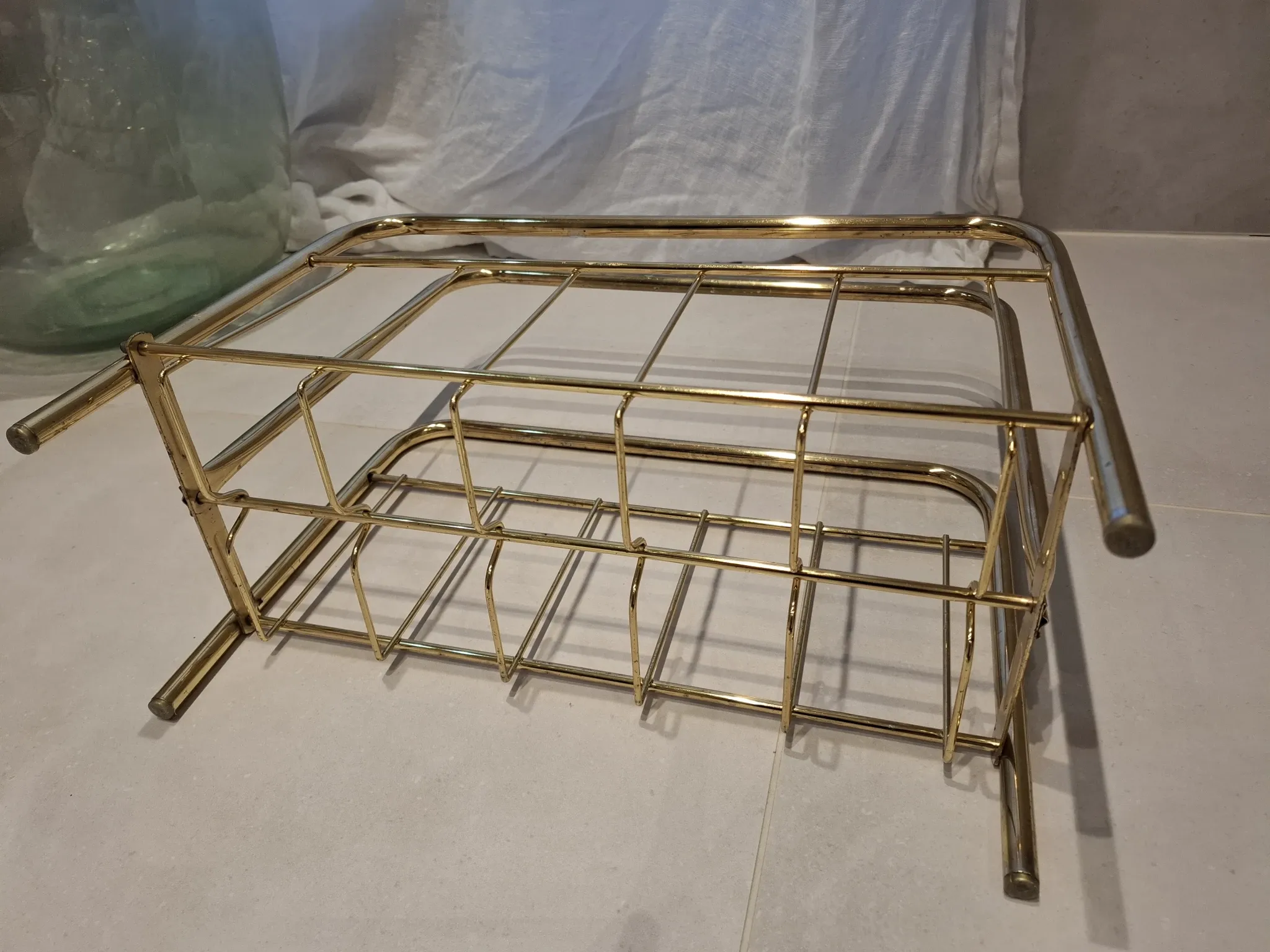 Golden metal magazine rack
