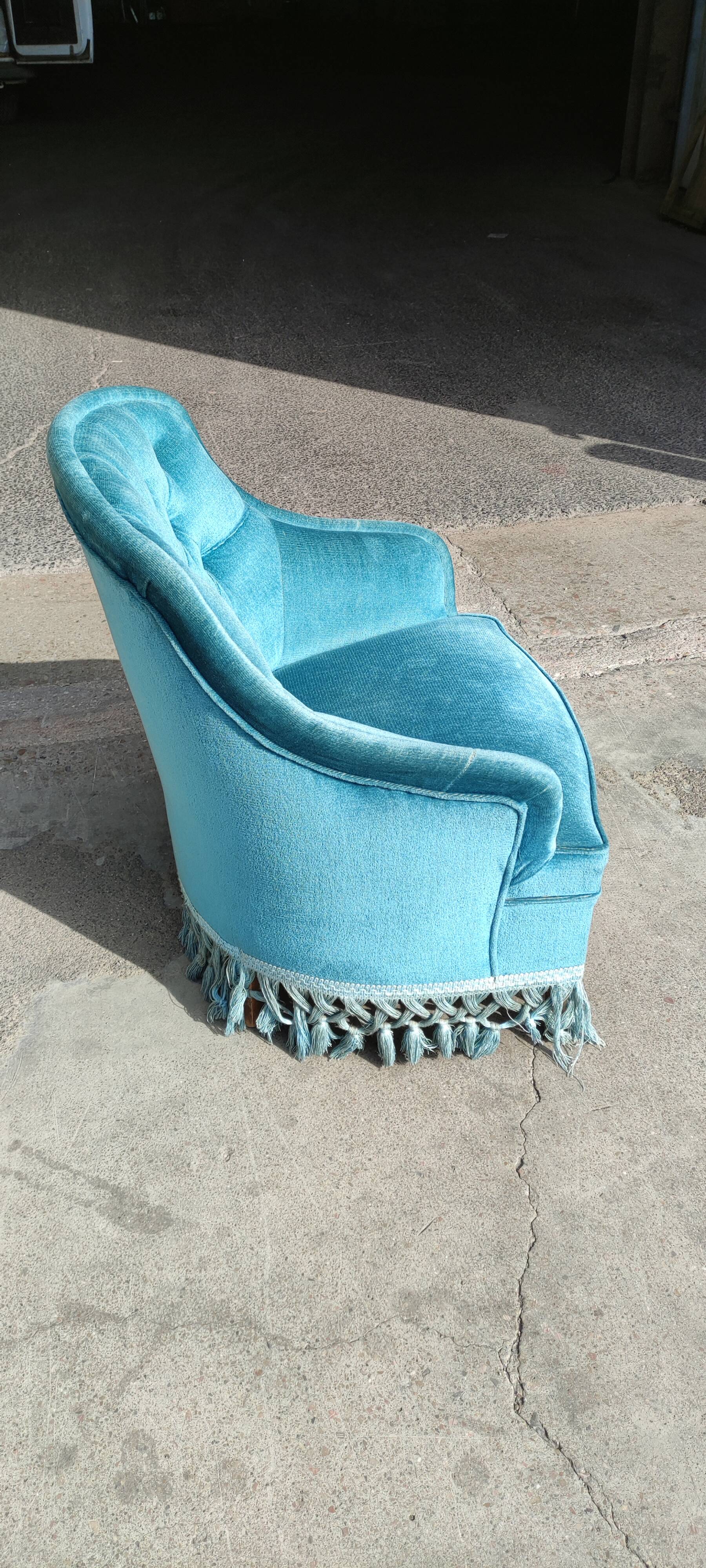 Blue velvet upholstered toad armchair