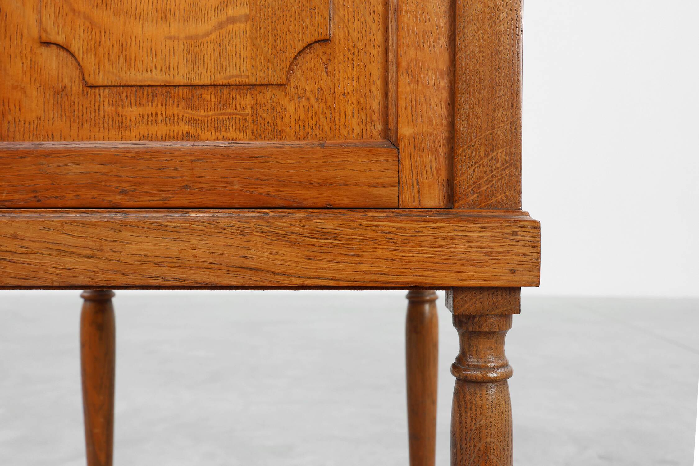Art Deco nightstand in oak with turned legs, France 1920
